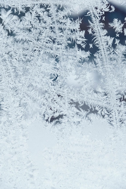 Patrones de hielo en vidrio congelado Patrón de hielo abstracto en vidrio de invierno como imagen de fondo