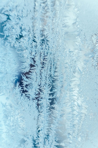 Patrones de hielo en vidrio congelado Patrón de hielo abstracto en vidrio de invierno como imagen de fondo