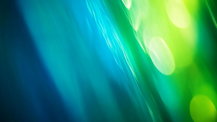 Los patrones de luz abstractos crean un efecto hipnotizante en vibrantes tonos azules y verdes