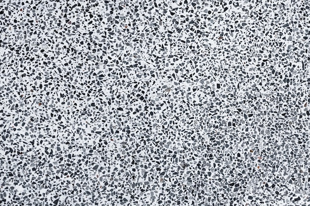 Foto pavimento de piedra de textura de pared de guijarros negros para patrón y fondo oscuro abstracto