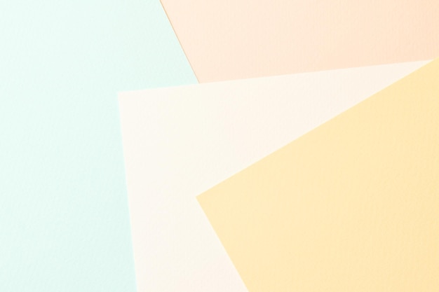 Pedaços de papel kraft áspero colagem fundo geométrico textura de papel cores pastel Mockup com espaço de cópia para textxA
