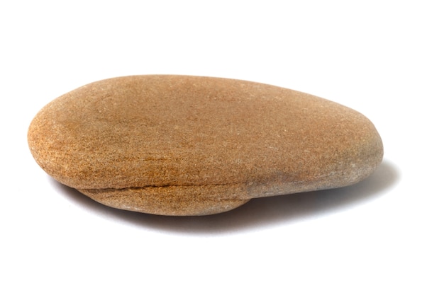 Pedra com sombra isolada no fundo branco. belos seixos do mar. Foto de alta qualidade