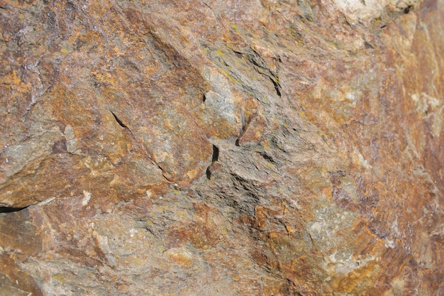 Pedra velha textura poderosa áspera em tela cheia com pequenos detalhes