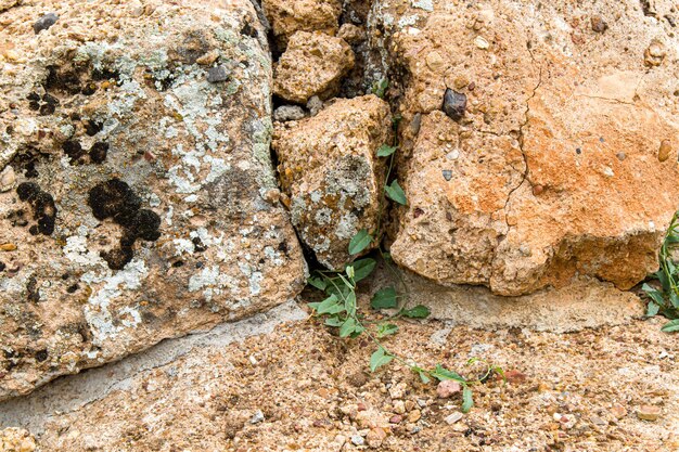 Foto pedras, pedras esmagadas e cascalho em close-up como um fundo abstrato