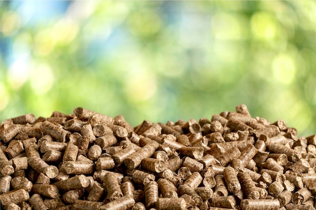 Foto pellets de biomasa- cerrar sobre fondo