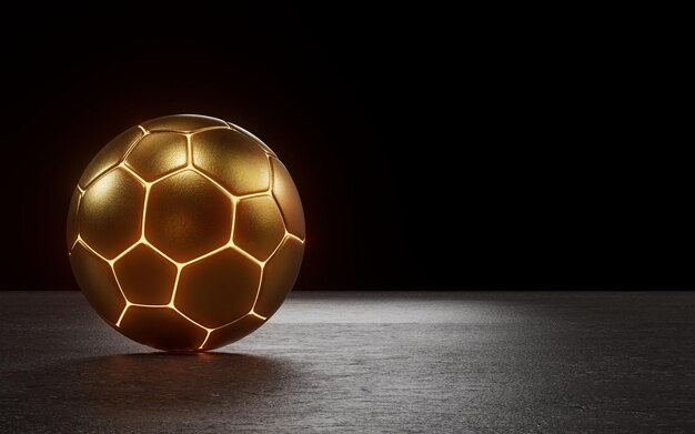 Una pelota de fútbol iluminada con material dorado en el piso de concreto