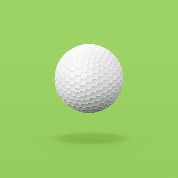 Pelota de golf sobre fondo verde