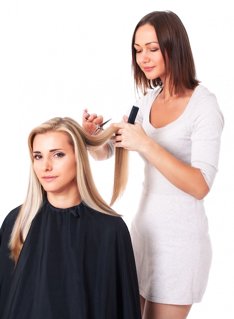 Peluquería corte de cabello aislado en blanco