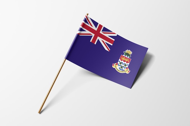 Foto pequena bandeira de papel das ilhas cayman em fundo branco