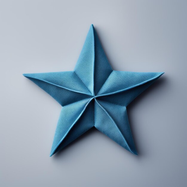 Pequeña estrella una estrella de origami azul en un fondo limpio