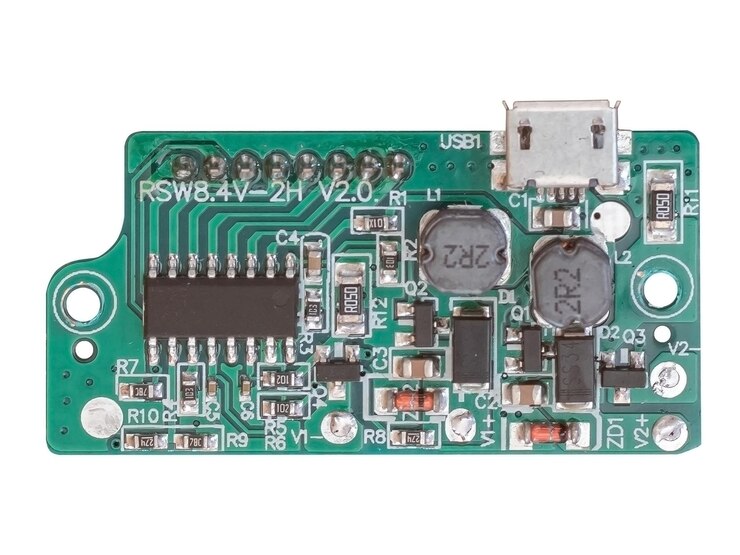 Foto pequeña placa eléctrica para la carga de la batería de la cámara con puerto micro usb aislado en blanco