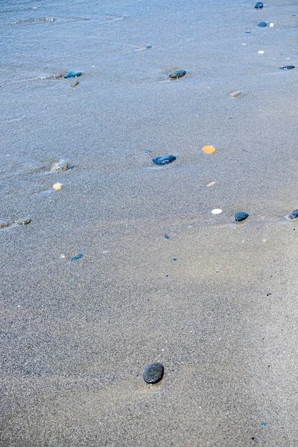 Pequenas pedras na praia