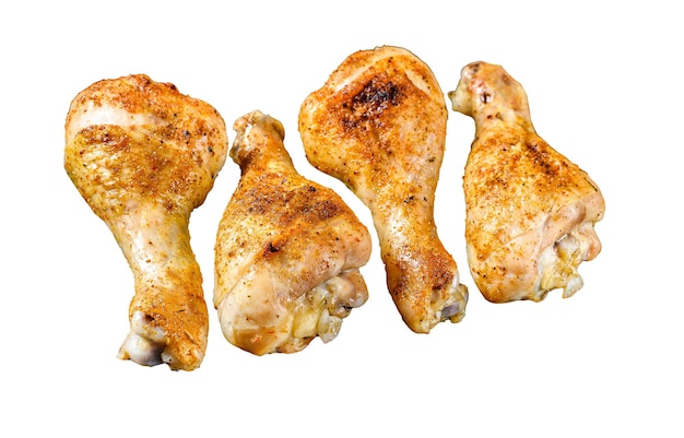 Pernas de coxa de frango assadas com ervas isoladas no fundo branco