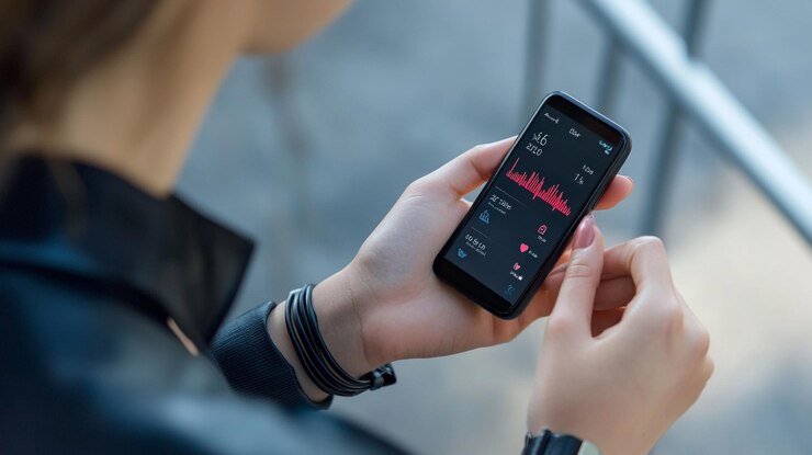 Foto una persona está sosteniendo un teléfono con el número 5 en él
