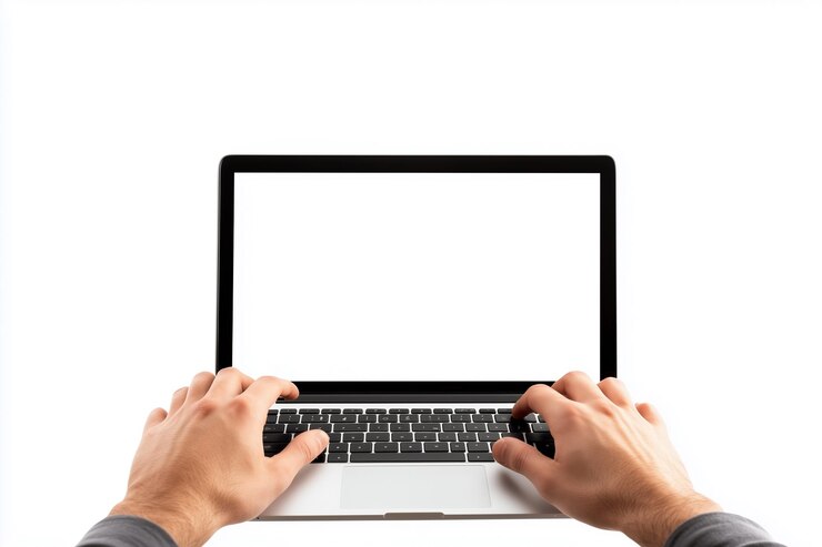 una persona está usando una computadora portátil con una pantalla en blanco