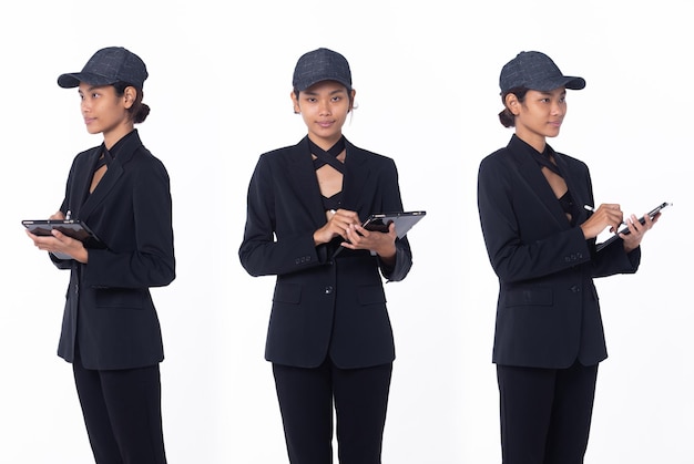 Persona de medio cuerpo de mujer adulta joven de piel bronceada trabaja duro en tableta digital Sonrisa femenina asiática alegre en vestido negro sobre fondo blanco aislado