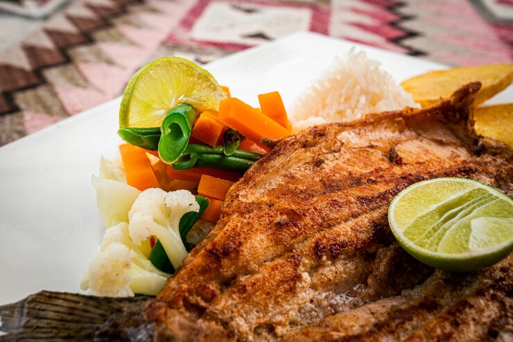 Pescado frito o trucha con ensalada vanity de coliflor y calabaza