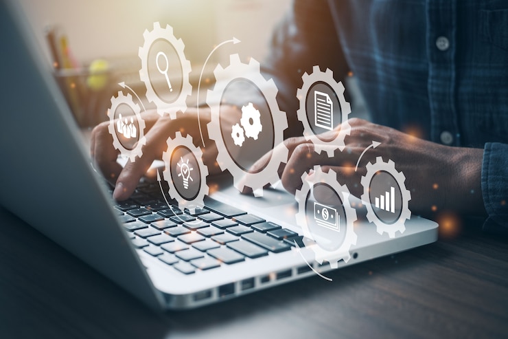 Foto pessoa que trabalha no computador. conceito de negócio do sistema de processo de tecnologia de software de automação.