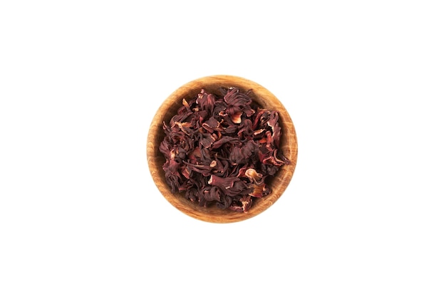 Pétalos de hibisco secos o Hibiscus sabdariffa en cuenco de madera Pétalos de Karkade utilizados para hacer té de hierbas