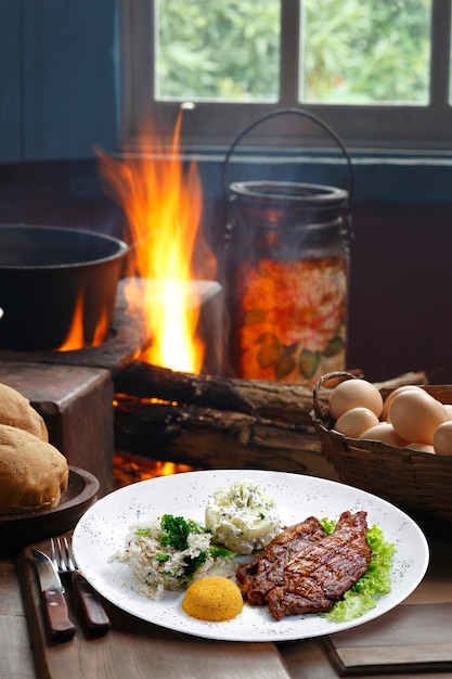 Picanha-Kartoffel mit Reis und Bohnentreiber