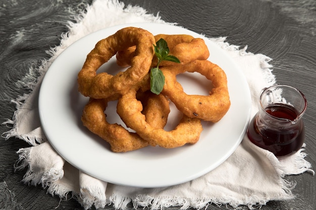 Picarones postre tradicional peruano comida dulce masa frita con miel