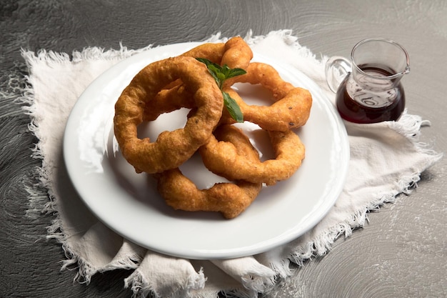 Picarones postre tradicional peruano comida dulce masa frita con miel