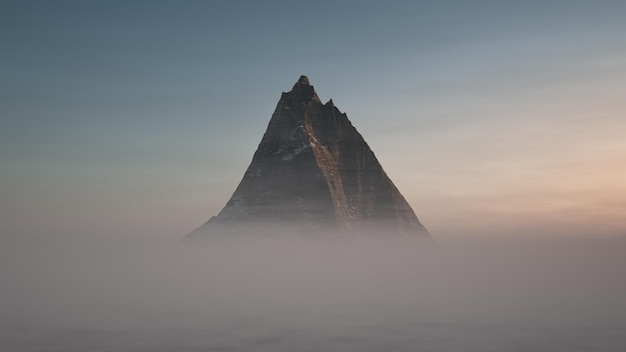 El pico de la montaña se eleva por encima de las nubes. Vista aérea