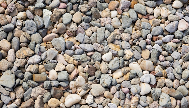 Piedra bebbles realista para el fondo.