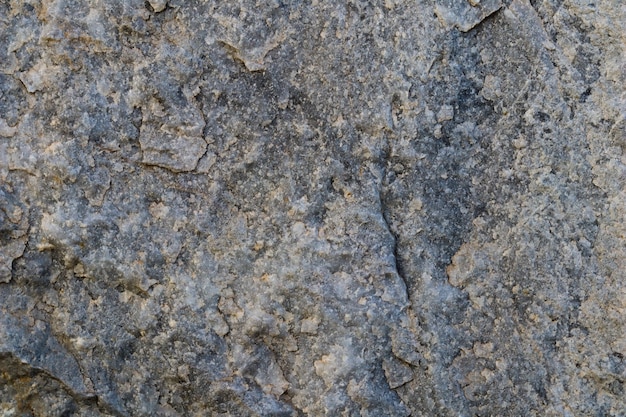 Piedra gris natural como fondo o textura perfecta para el diseño