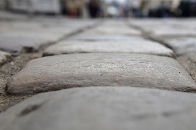 Piedras de una carretera pavimentada vista de cerca fondo abstracto