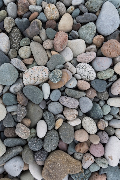 Piedras grises del mar Fondo de piedras grises mojadas del mar para el diseño. Foto de alta calidad