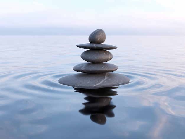 Piedras zen equilibradas en agua