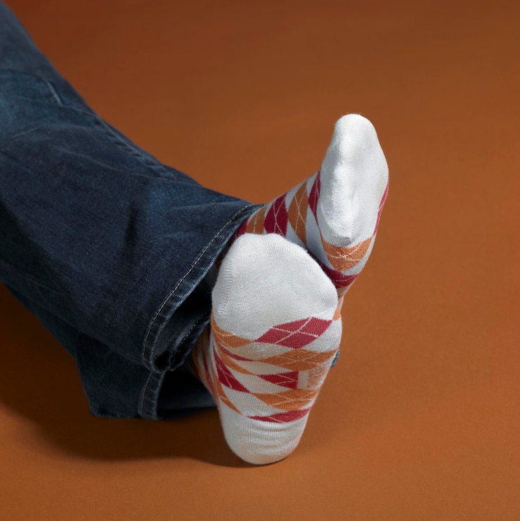 Foto los pies descansando en los calcetines