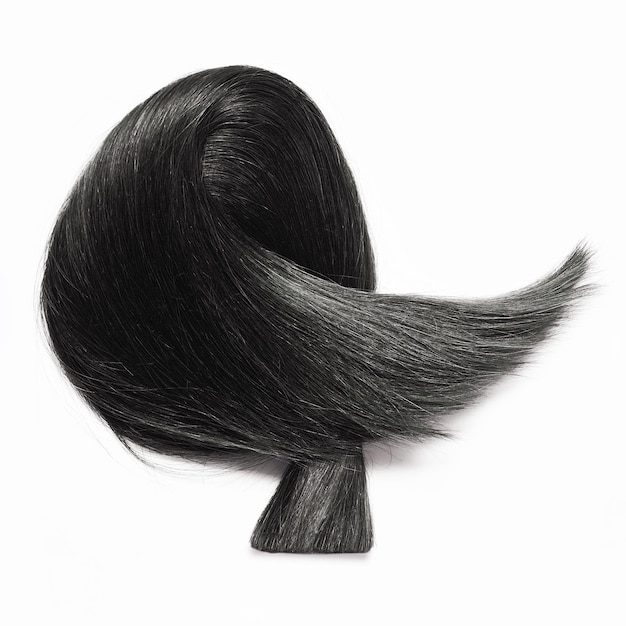 Una pieza de cabello con una cola larga y una pieza de cabello negro.
