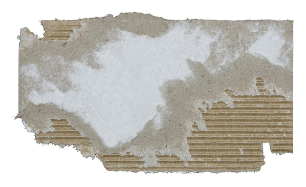 Foto piezas rasgadas de papel corrugado aisladas sobre un fondo blanco