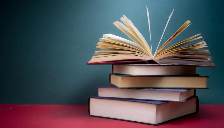 una pila de libros con la palabra el uno en la parte superior