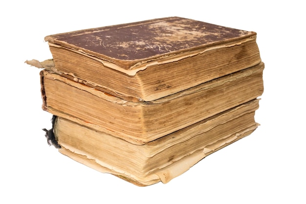 Una pila de libros viejos hechos jirones Vintage libros rotos Antigüedades aisladas