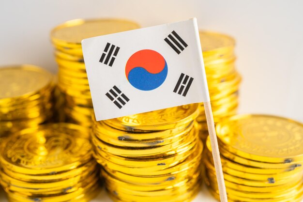 Pila de monedas de dinero con el concepto de banca financiera de bandera de Corea