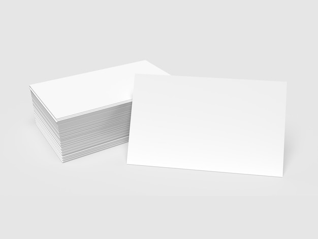 Foto pila de tarjetas de presentación blancas con una tarjeta de presentación frontal aislado sobre un fondo blanco.