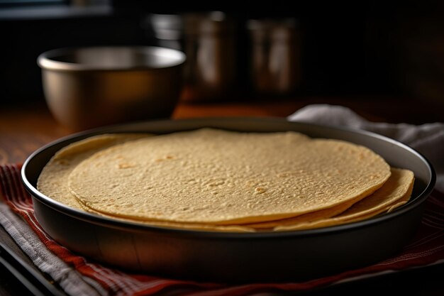 Una pila de tortillas en una mesa de madera con tomates rojos y maíz en el fondo generado por IA