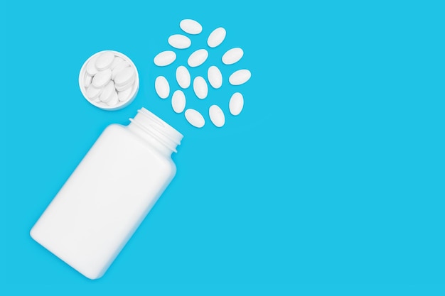 Píldoras blancas para el tratamiento con botella sobre fondo azul concepto de farmacia y medicina vista superior