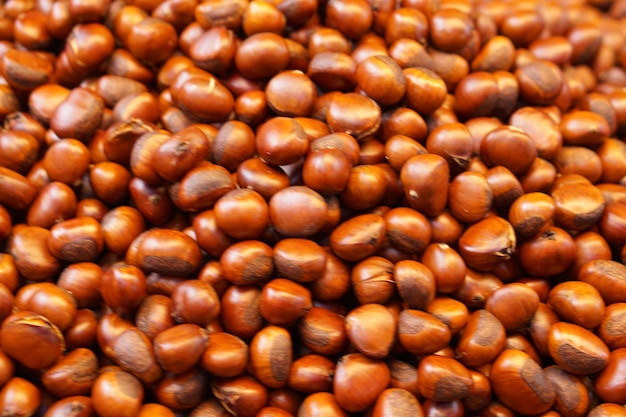 Pilha de castanhas de vista superior Pilha de castanhas maduras para fundo alimentar