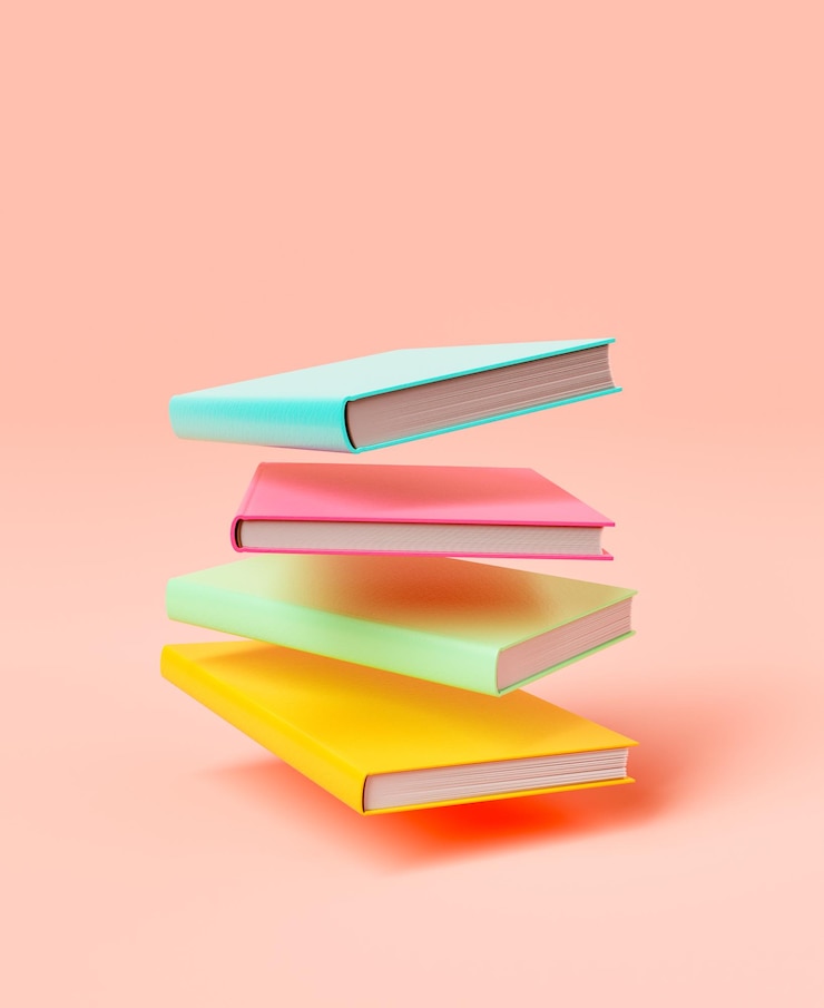 Pilha de livros coloridos contra um fundo rosa