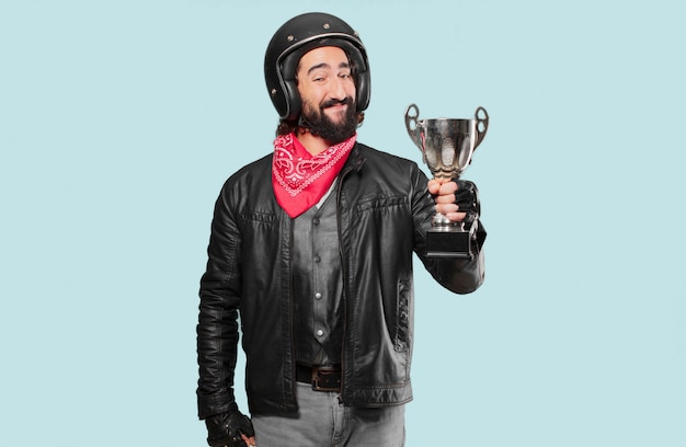 Piloto de moto, ganhando um troféu