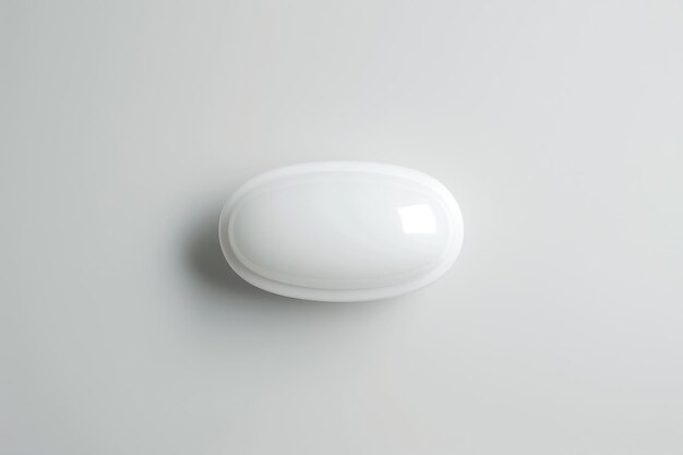 Foto pílula blanca brillante sobre un fondo blanco