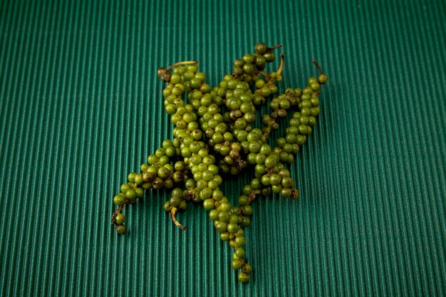 Pimenta Com papel verde ondulado