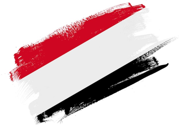 Pincel de pintura abstracta con textura bandera de Yemen sobre fondo blanco.