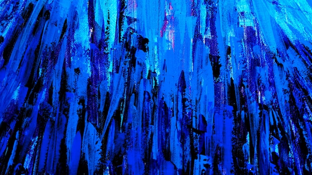 Pincelada de pintura escura azul abstrata em fundo de tela