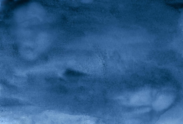Foto las pinceladas de acuarela azul marino pintadas a mano en la textura del papel acuarelado azul marino artístico