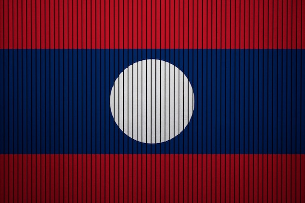 Pintado bandera nacional de Laos en un muro de hormigón